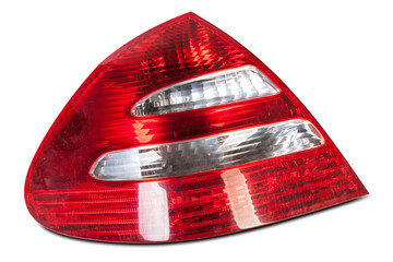 Wall Mural - A taillight of a stop signal for a German auto - optical equipment of white and red color on a white isolated background. A spare part for repair and sale in a car service center