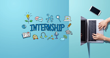 Wall Mural - Internship with person working with a laptop