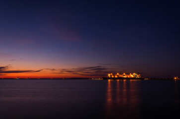 Canvas Print - LNG TANKER - Ship at the gas terminal with sunrise 