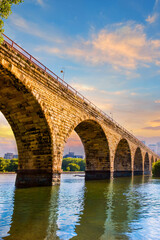 Wall Mural - Minneapolis Minnesota at sunset on the Mississippi river, USA