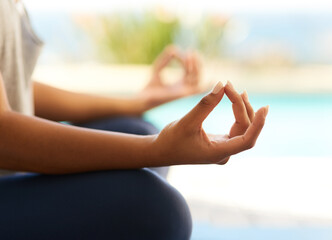 Poster - Finding balance. Cropped shot of an unrecognizable young woman meditating outdoors.