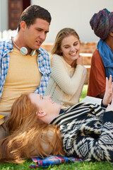 Poster - Taking a break is important in preventing the study blues. Shot of a student relaxing outside with her friends.