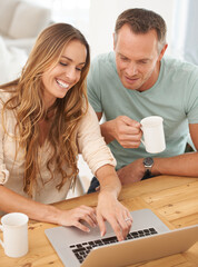 Wall Mural - Our finances are in good order. Cropped shot of a couple doing their monthly budget at home.