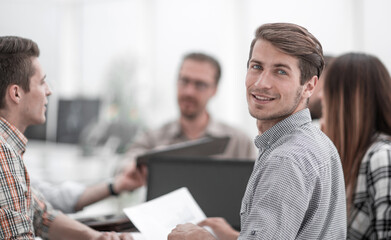 Wall Mural - close up.successful employee sitting at the Desk