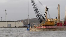 Industrial Barge Doing Maintenance Dredging In Gota Alv, Hisingen, Gothenburg