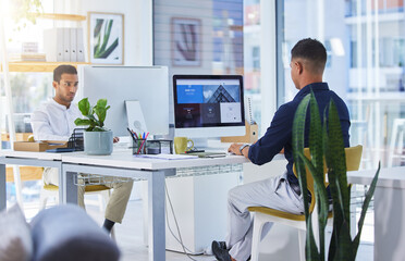 Poster - You know how to reach us. Shot of two men working on their computers in a modern office.