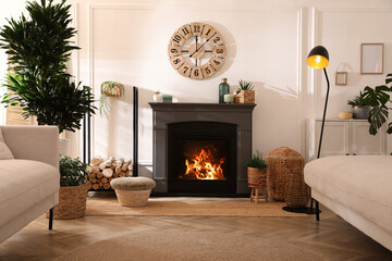 Sticker - Stylish living room interior with electric fireplace, comfortable sofas and beautiful decor elements