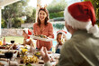 © Chanelle Malambo/peopleimages.com - Be jolly and fill your belly. Cropped shot of a happy family having Christmas lunch together.