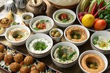 Fototapeta Uliczki - mixed middle eastern meze sharing food platter in turkish restaurant