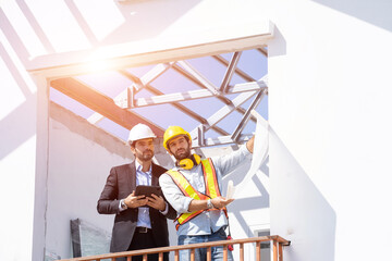 Poster - Engineer with businessman are planning construction in construction site,New residential subdivision home building work site.