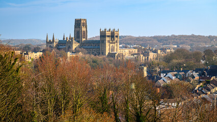 Poster - Durham Cathedral dominates the city, which is in County Durham in the northeast of England built on the banks of River Wear.  Its Castle and Cathedral sites are now a UNESCO World Heritage Site