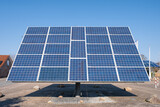 Fototapeta Kuchnia - Solar panel, battery renewable energy on sky background