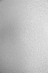 Poster - Water droplets on gray background covered with water droplets, bubbles in water.