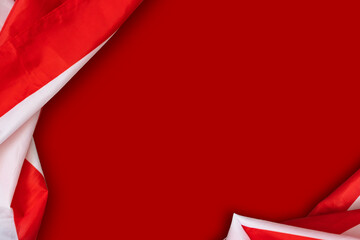 fragment of the flag of the United States on a red background