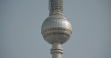 Close Up Of The Berliner Fernsehturm On A Sunny Day With The Blue Sky In The Background