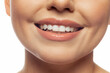 © master1305 - Cropped image of beautiful female lips, teeth, neck and chin isolated over white studio background.