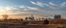 Farmland Producing Ethanol For The Oil And Gas Industry.  Railroad Tankers Cars Lined Up Near A Ethanol Plant At Sunset.