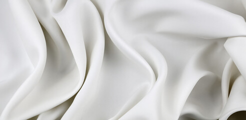 Wall Mural - Close-up of rippled white silk fabric lines