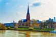 Aerial view over river Main and nearby church in Frankfurt am Main, Germany.