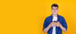 © carballo - young man with mobile phone isolated on background