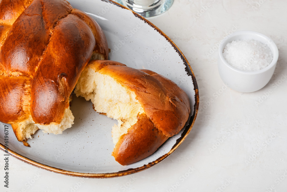 Traditional challah bread on white background. Shabbat Shalom