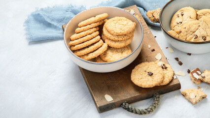 Wall Mural - Delicious oat cookies on light background.