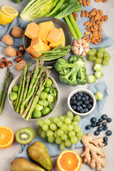 Wall Mural - Raw and fresh vegetables and fruit on light background.