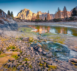 Canvas Print - Astonishing morning view of frozen Limides lake. Majestic autumn landscape of Dolomite Alps. Superb outdoor scene of Falzarego pass, Italy, Europe. Beauty of nature concept background.