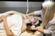 © Ihor - Cosmetic facial skin care procedure in the cosmetologist's office for a woman