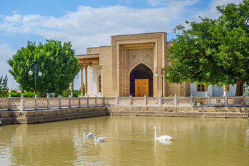 Wall Mural - Panorama of pond and park in the center of the architectural ensemble of the mausoleum of Bahauddin Nakshband, Bukhara, Uzbekistan