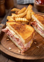 Wall Mural - Grilled ham and cheese sandwich with french fries