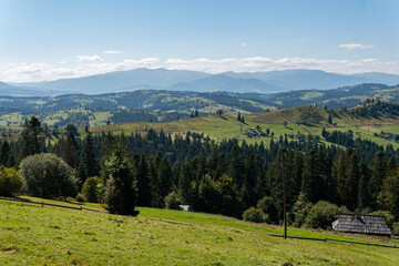 beautiful landscape of nature, mountains and forest in rural area on a sunny summer day
