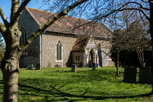 All Saints Church In The Small Village Of Sutton In The Rural British Countryside