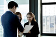 © kamiphotos - Meeting room atmosphere and business groups are meeting, discussing and planning business operations for more profitable growth. Concept of business meeting and company administration.