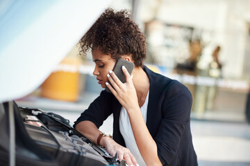 Poster - I cant figure out whats wrong. Cropped shot of an attractive young businesswoman calling roadside assistance after her car broke down.