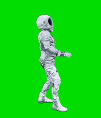 Wall Mural - Astronaut isolated on green background