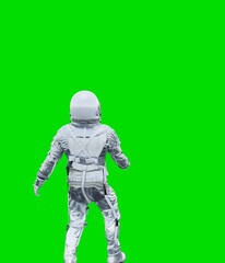 Wall Mural - Astronaut isolated on green background