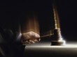 © SuperStock - Close-up of a judge handing down a verdict