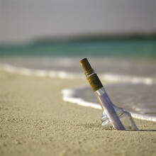 Message In A Bottle On The Beach