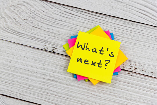 What's next text on colorful adhesive notes