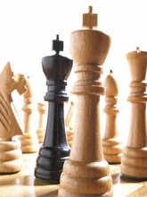 Close-up Of Chessmen On A Chess Board