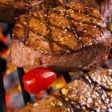 Close-up Of Steaks Cooked Over A Barbecue Grill