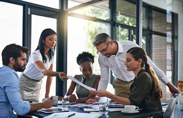 Aufkleber - They always do great work together. Shot of a group of businesspeople having a meeting in a boardroom.
