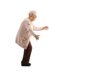 Poster - Full length profile shot of an elderly woman waiting with arms wide open