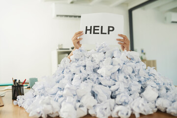 Aufkleber - Help, Im drowning in paperwork. Shot of an unidentifiable businesswoman drowning under a pile of paperwork in the office.
