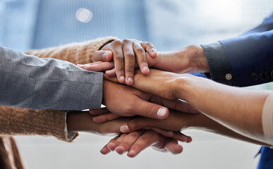 Sticker - We have to motivate each other. Shot of a group of people with their hands stacked.