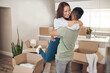 © Jeff Bergen/peopleimages.com - Owning your own house is the best feeling ever. Shot of a couple looking cheerful while moving into their new home.