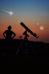 Wall Mural - silhouette of a man, telescope and countryside under the starry skies with young moon.