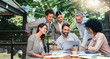 © Jadon Bester/peopleimages.com - Sometimes a change in scenery is just whats needed. Cropped shot of a group of business colleagues having a meeting outdoors at a cafe.
