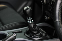 Automatic Transmission Shift Selector In The Car Interior. Closeup A Manual Shift Of Modern Car Gear Shifter. 4x4 Gear Shift